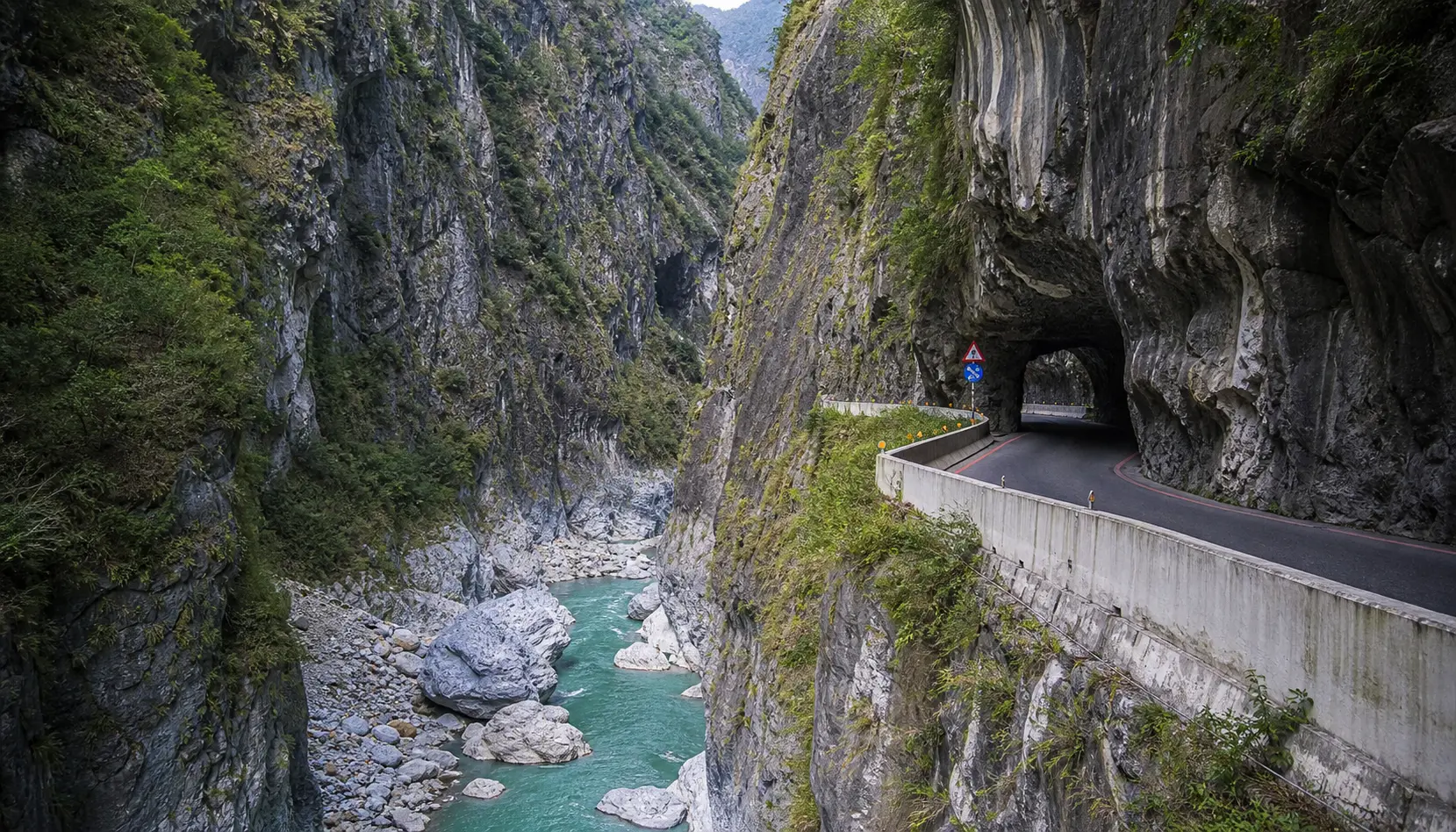 Marble walls of Taroko Gorge plunging to the jade Liwu river
